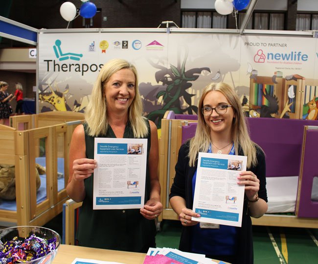 Sales women holding promotional flyers
