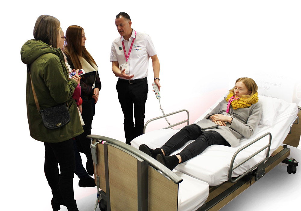 Shaun Masters OT leading educational class on adjustable beds