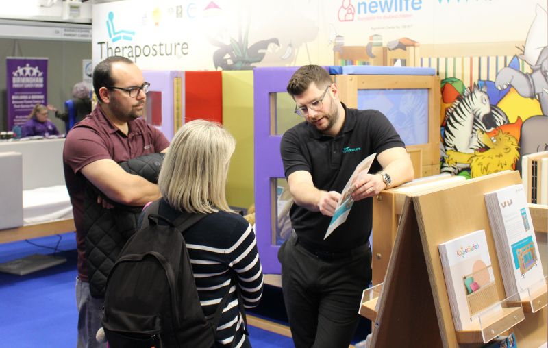 visitors to Theraposture's stand at Kids South exhibition